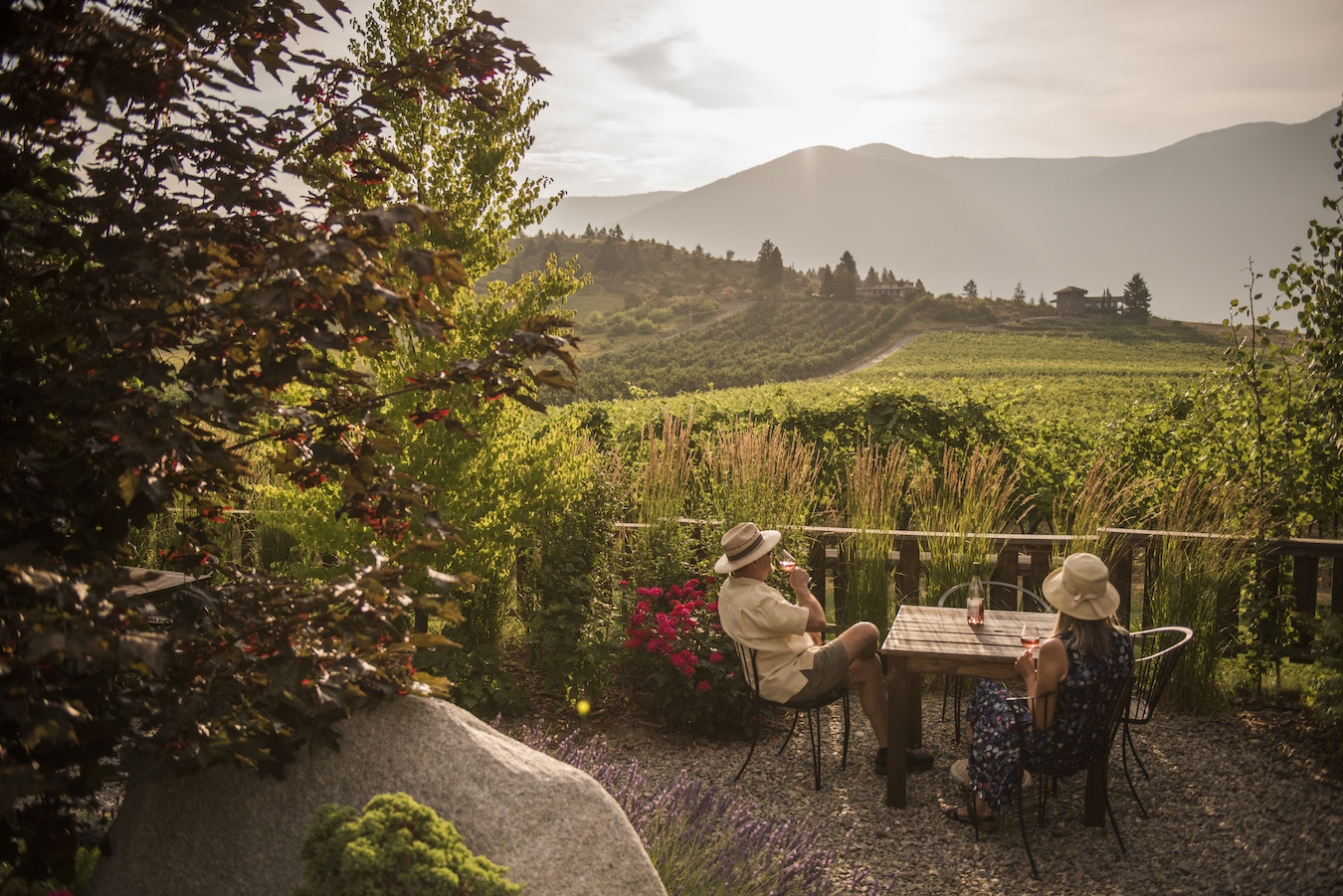 A couple enjoys a wine tasting at the Baillie-Grohman Estate Winery in Creston, BC.