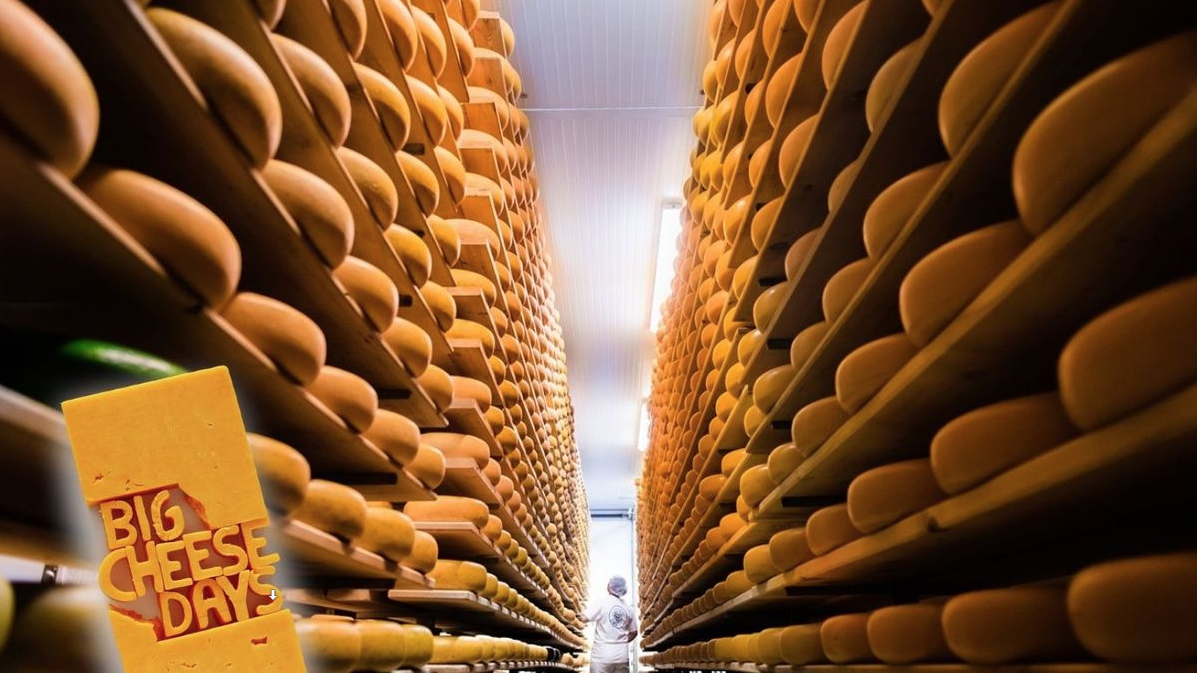 The Big Cheese Days logo is shown alongside a photo of a cheese cave