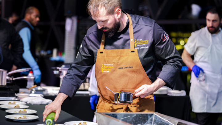 Canadian Culinary Champion Chef Jasper Cruickshank plates a dish during the Mystery Wine Pairing Challenge.